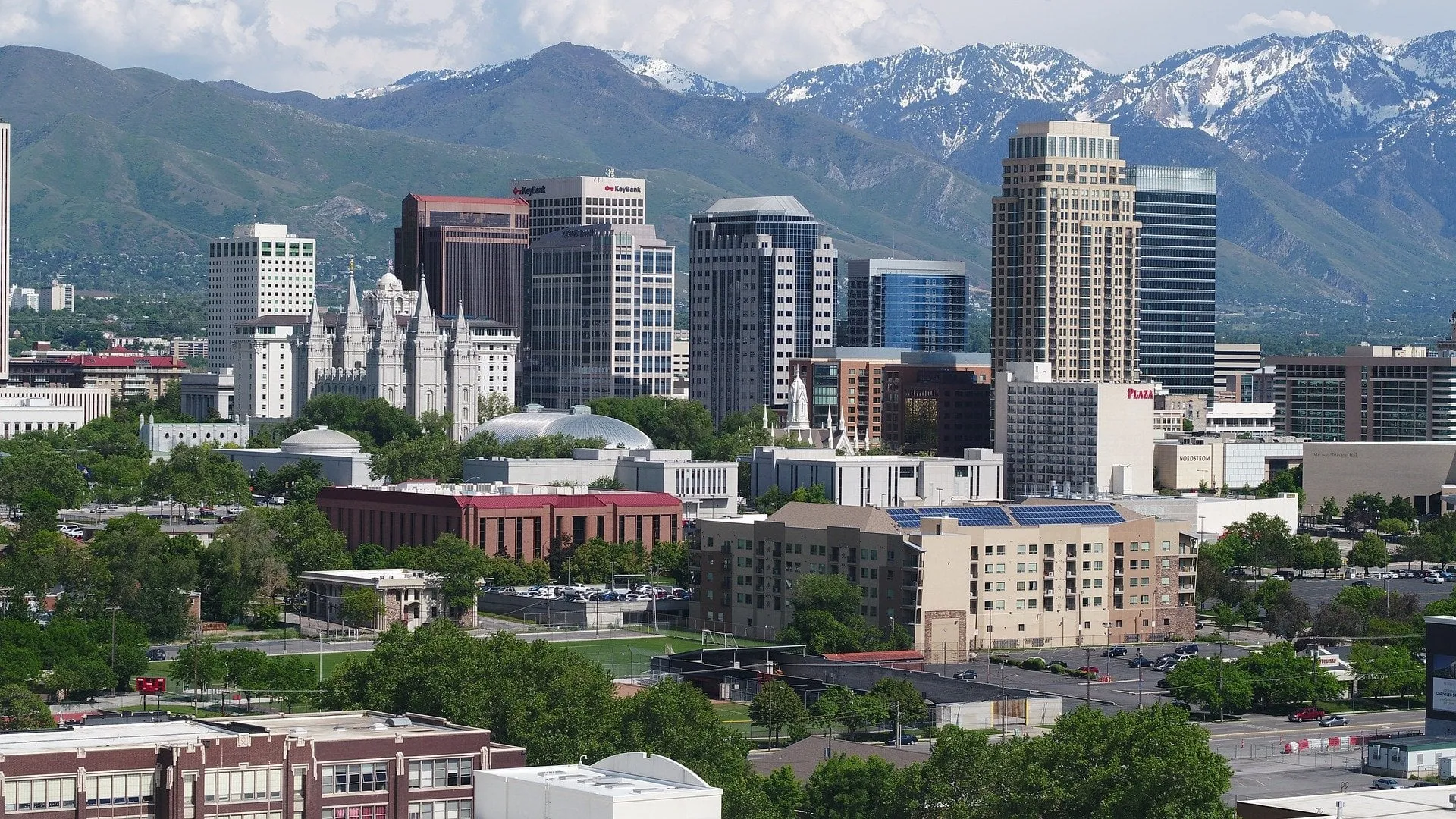 The Salt Lake City skyline with the Wasatch mountains behind it
